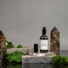 Room spray bottle labeled 'Neroli Ylang Bergamot' with a free shipping offer on a neutral background.