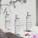 Three distinct fragrance oil bottles. Group