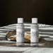 Luxury hotel-inspired aroma oil bottle styled for a clean product shot. Group