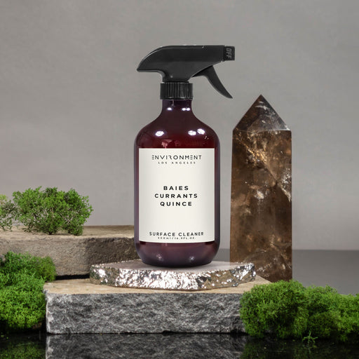 All Purpose Baies Cleaner on rocks with greenery