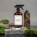 All Purpose Baies Cleaner on rocks with greenery